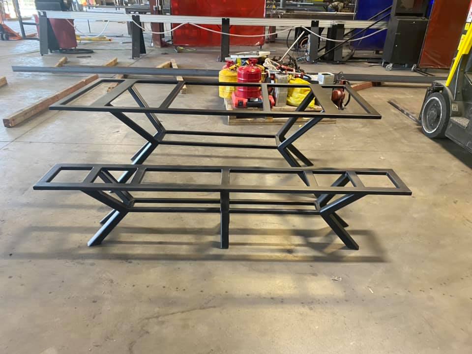 A close-up of the table and bench steel frame.
