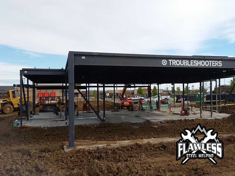 Erected steel structure on Bank of America in highlands Ranch construction site.